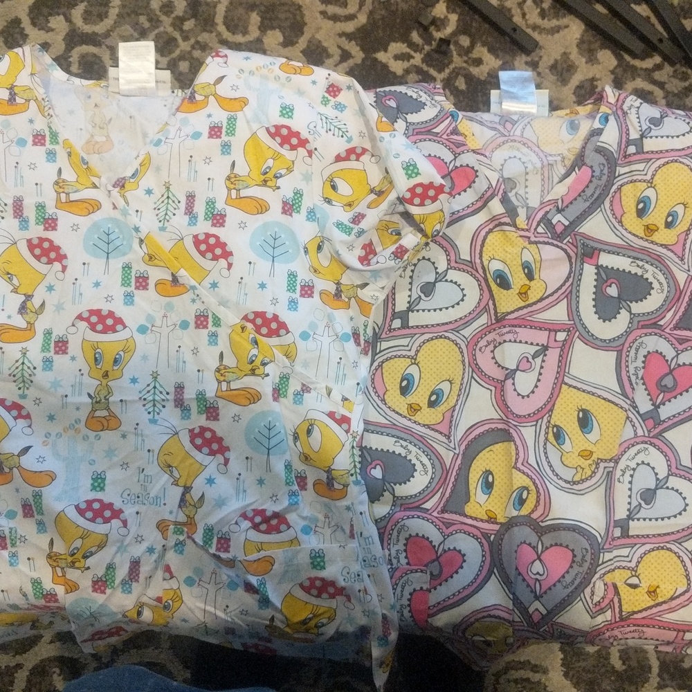Lot of 2 Looney Toons scrub tops size xs. Tweety Bird print.